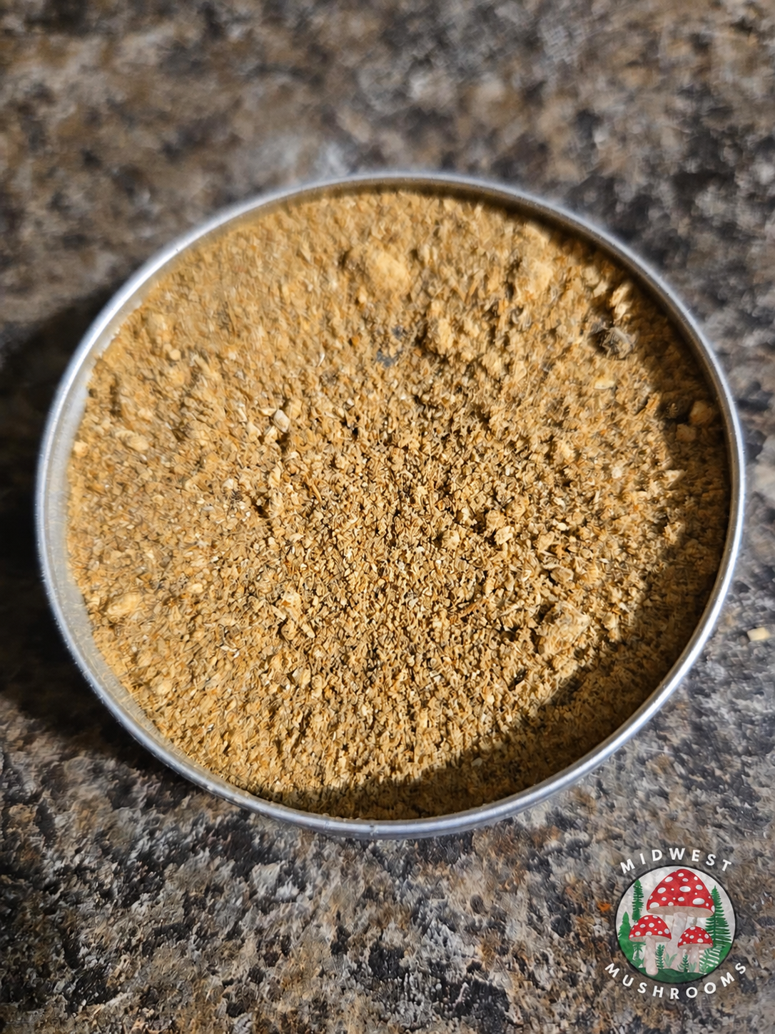 Close-up of Midwest Mushrooms mushroom seasoning salt blend in a metal bowl