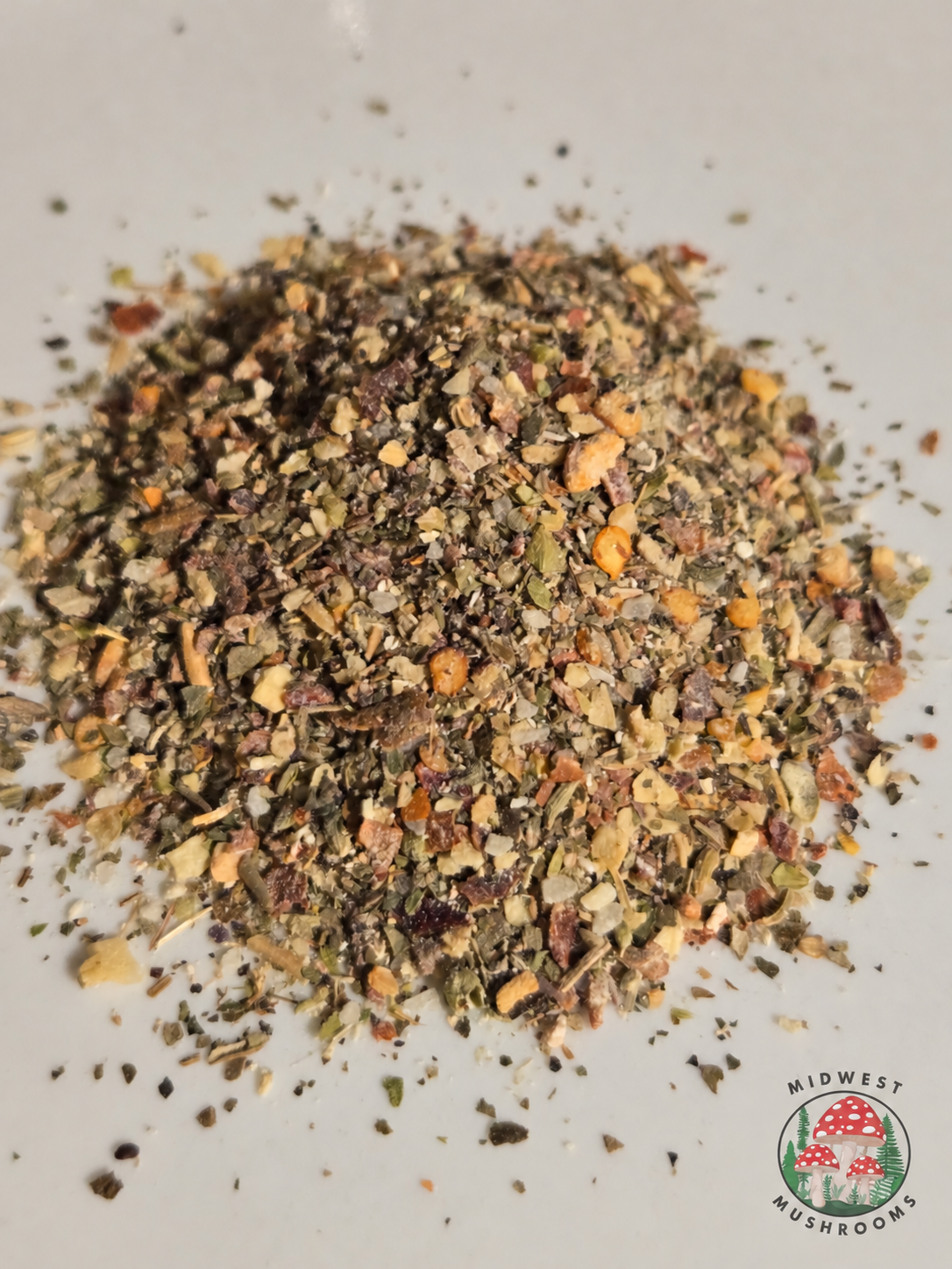 Close-up of Slice Spice mushroom pizza seasoning blend with Midwest Mushrooms watermark